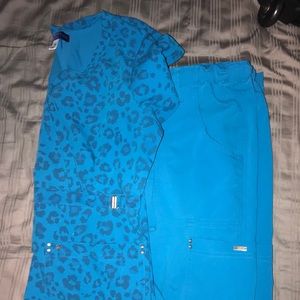 SOLD. KOI Sapphire Scrub set